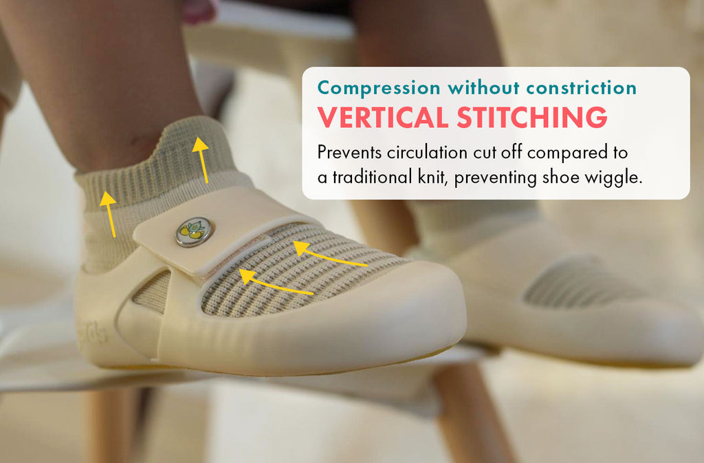 Compression without constriction. Vertical stitching. Prevents circulation cut off compared to a traditional knit while preventing shoe wiggle.