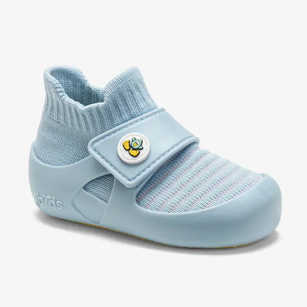 jbrds Stand2Walk toddler shoe in Reveal Blue featuring a stable heel cup and anatomical foot-shaped design on a white background.
